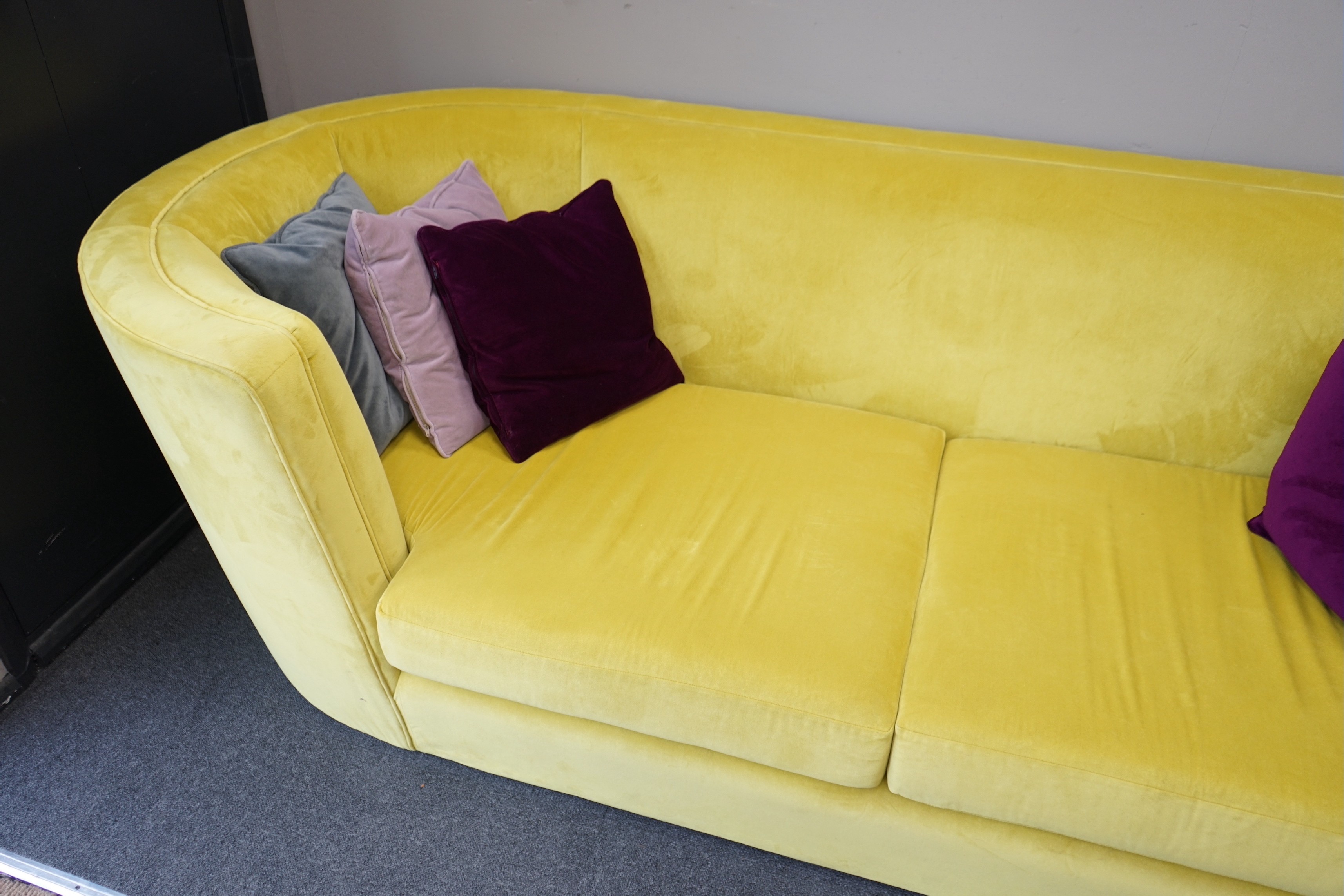 A contemporary Conran tub framed settee, upholstered in Italian Wattle velvet, with up to date fire safety standards, length 250cm, depth 102cm, height 78cm